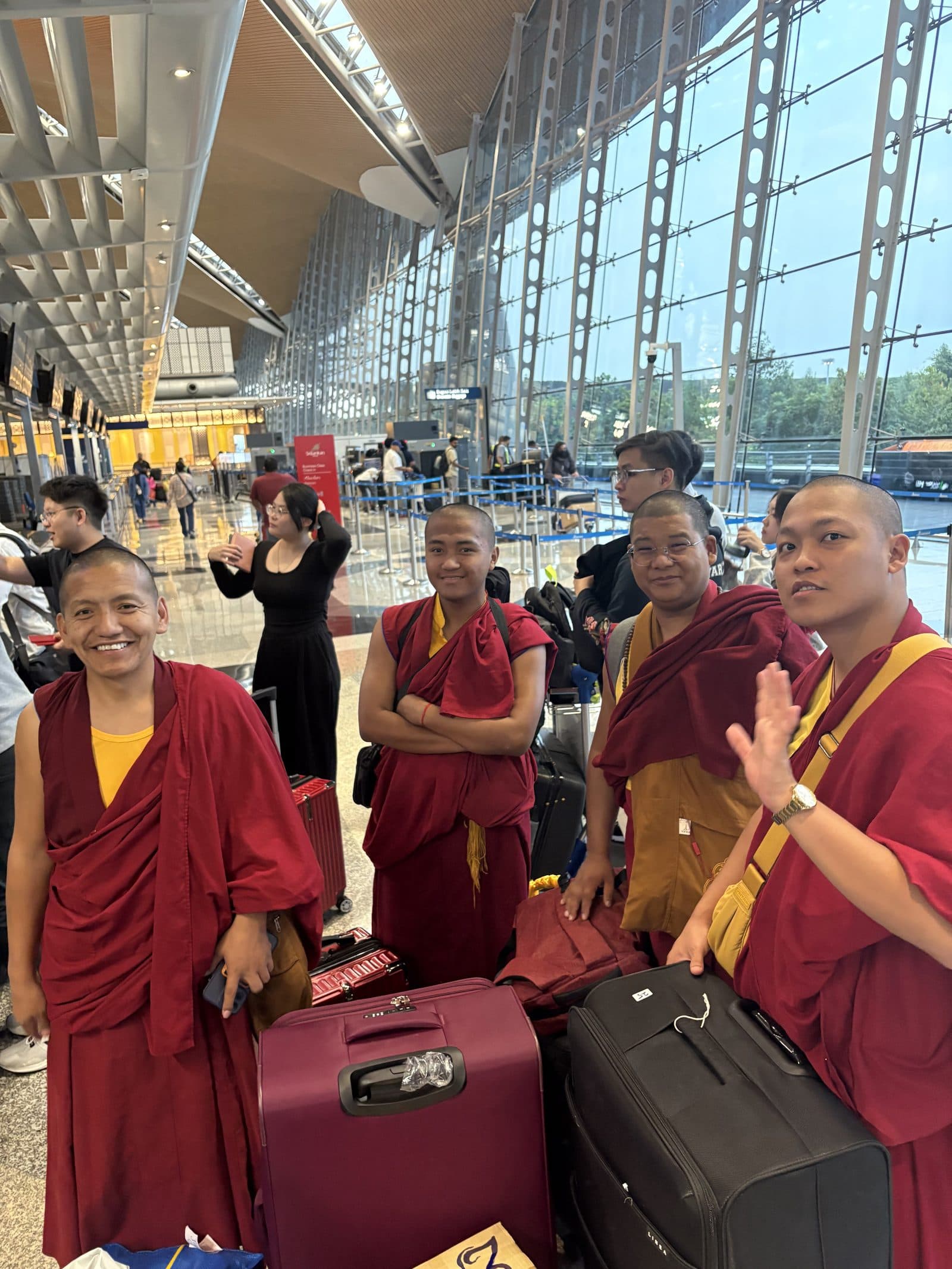 Farewell with Khen Rinpoche and the monks at the airport