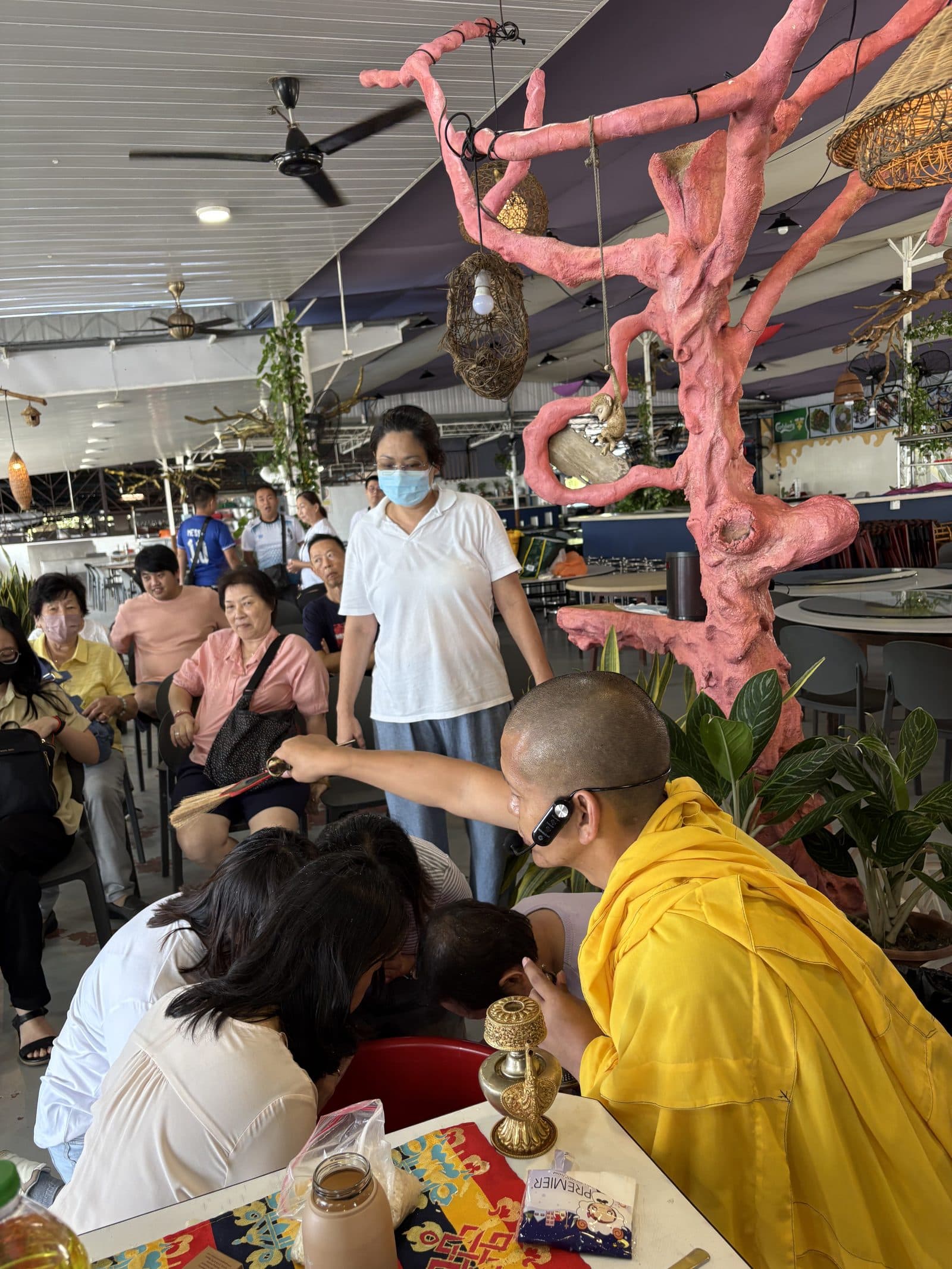 Khen Rinpoche blessing devotees in Malaysia